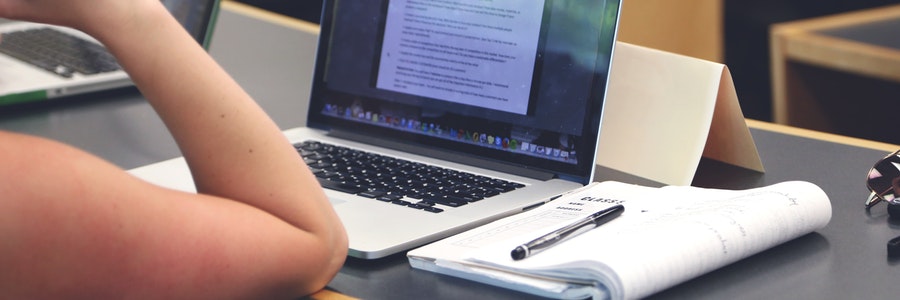 woman with computer in class